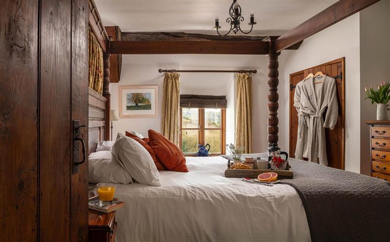 A bedroom in The Old Farmhouse at The Old Farmhouse, Combe Martin