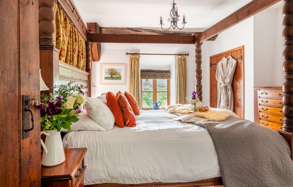 One of the 3 bedrooms (photo 2) at The Old Farmhouse in Combe Martin