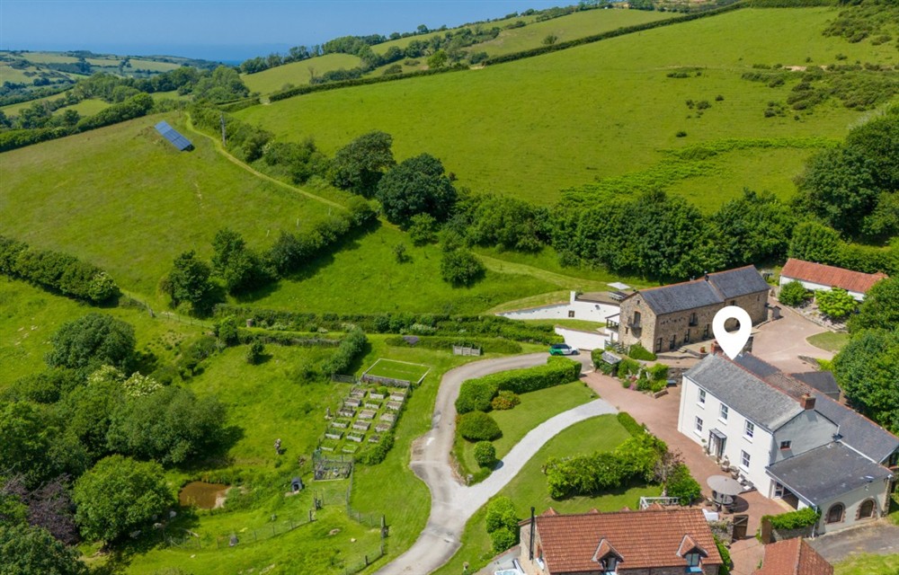 This is the garden (photo 2) at The Old Farmhouse in Combe Martin