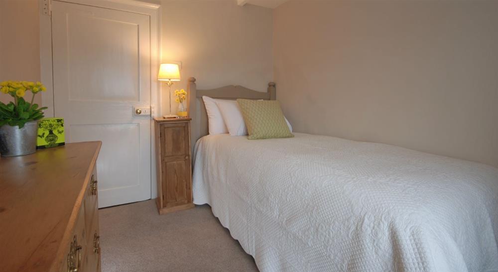 The single bedroom at The Old Farmhouse in Polzeath, Cornwall