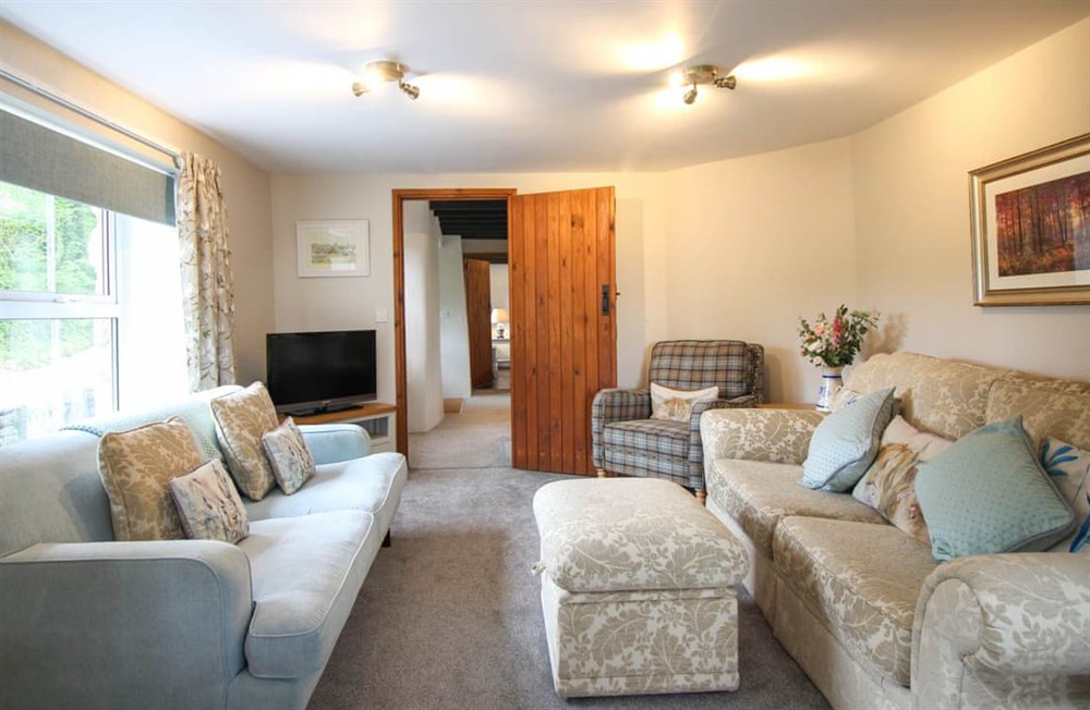 Living area (photo 3) at The Old Farmhouse in Wadebridge, Cornwall