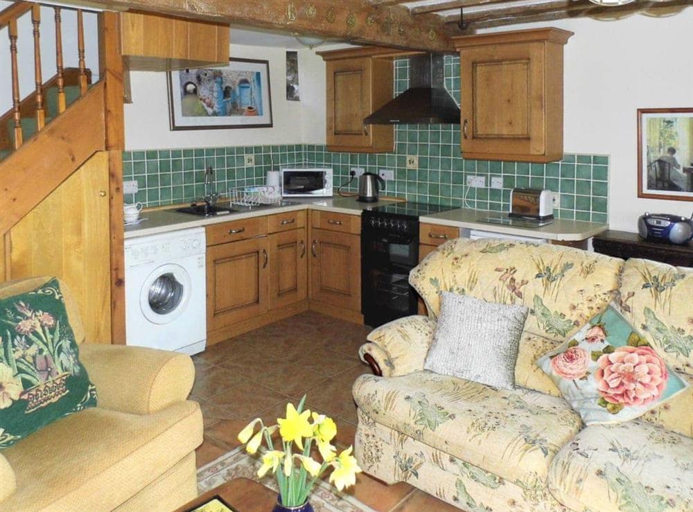 Open plan living/dining room/kitchen (photo 2) at The Old Forge in Beckermet, near Egremont, Cumbria