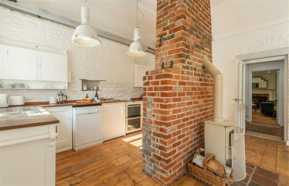 Feature chimney in kitchen at The Old Forge, Binham near Fakenham