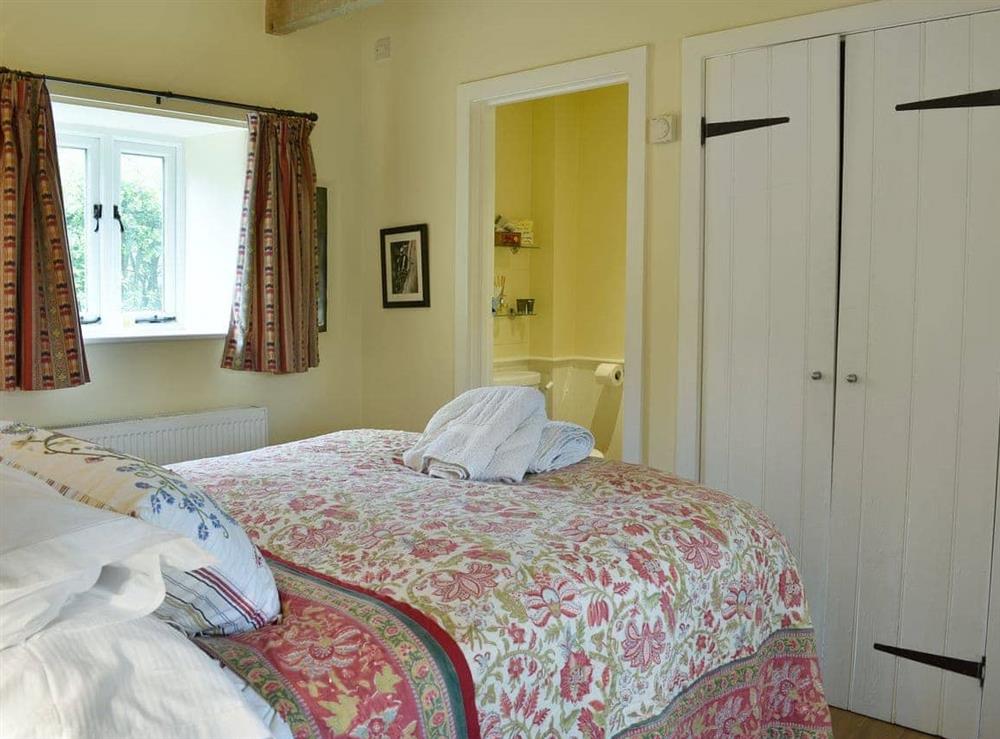 Beautifully presented double bedroom with en-suite shower room (photo 2) at The Old Forge in Lower Wraxall, Nr Dorchester., Dorset