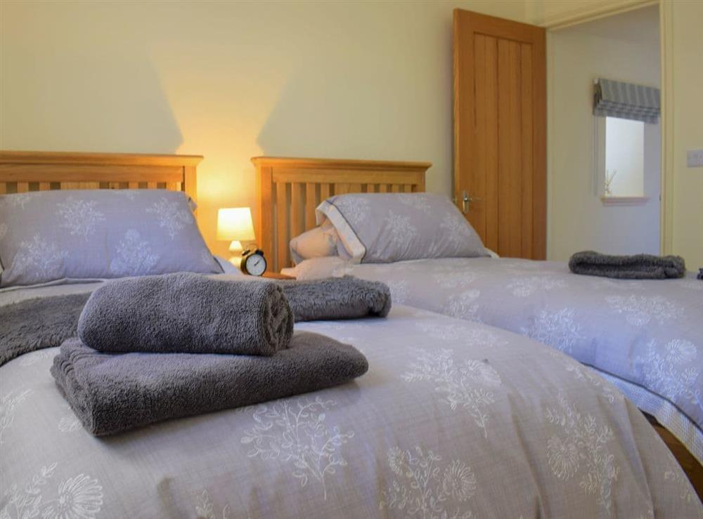 Twin bedroom at The Old Frame House in Rock, Northumberland