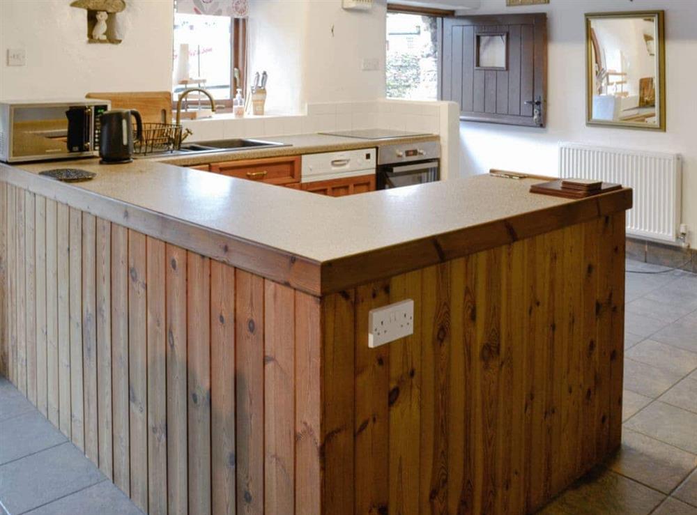 Charming open kitchen/ dining area at The Old Goat House in Thornton Rust, Leyburn, North Yorkshire