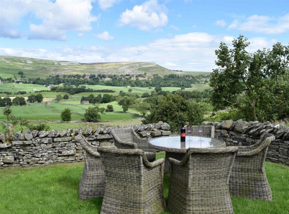 Sitting out area with great views at The Old Goat House in Thornton Rust, Leyburn, North Yorkshire