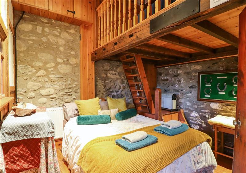 A bedroom in The Old Granary at The Old Granary, Henryd