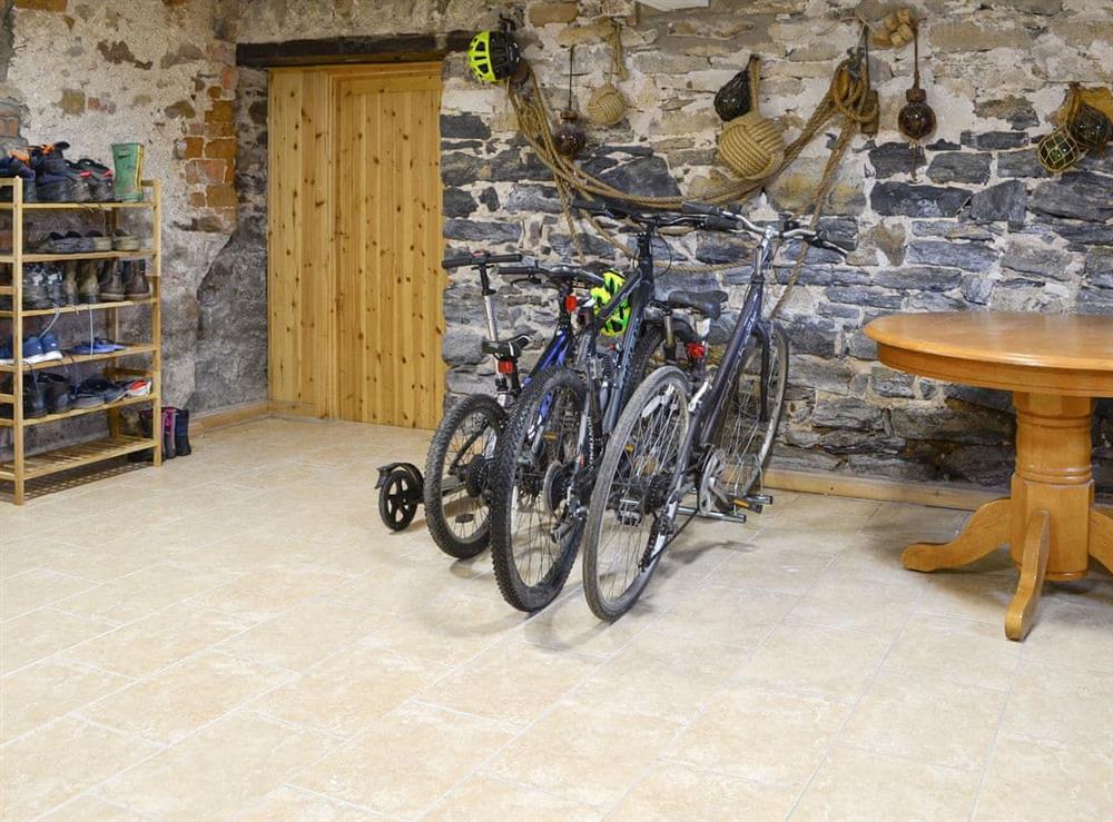Large utility room with bike/boot store and laundry areas at The Old Granary in Holy Island, near Berwick-upon-Tweed, Northumberland