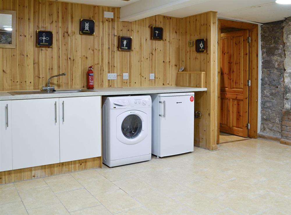 Large utility room with laundry and bike store