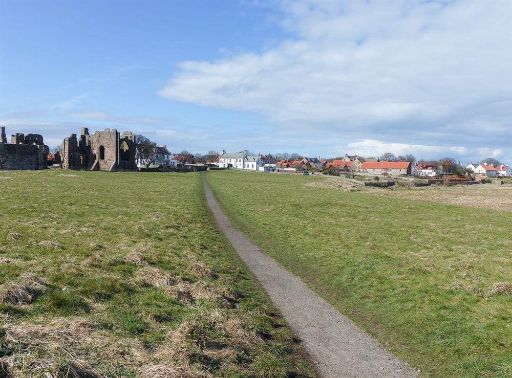 Photo showing the property’s proximity to the ruined priory on Holy Island at The Old Granary in Holy Island, near Berwick-upon-Tweed, Northumberland