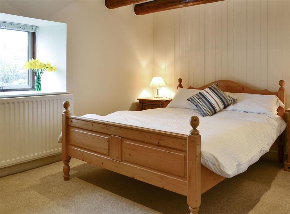 Relaxing double bedroom at The Old Granary in Holy Island, near Berwick-upon-Tweed, Northumberland