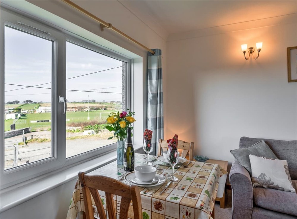 Living room/dining room at The Old Granary in Marazion, Cornwall