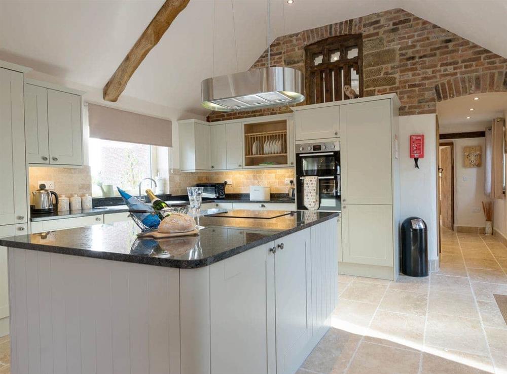 Spacious kitchen with ‘island’ at The Old Granary in Sloothby, near Alford, Lincolnshire