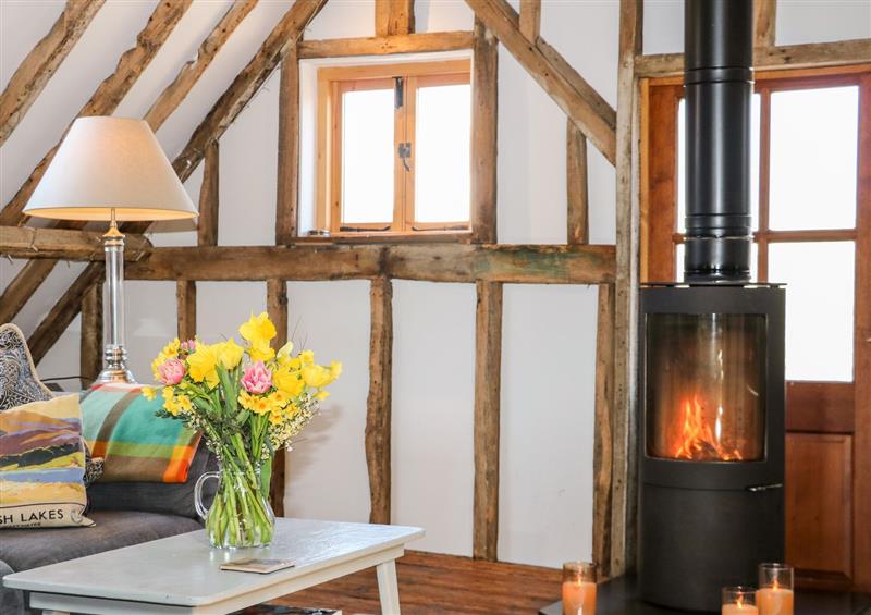 Relax in the living area at The Old Granary, West Chiltington