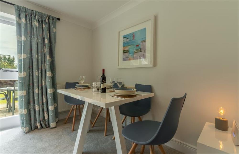 Ground floor:  Dining area with french doors to garden at The Old Joinery, Cley-next-the-Sea near Holt