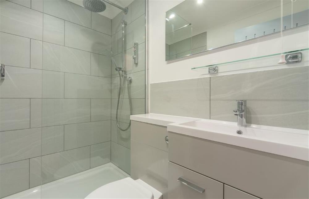 Ground floor:  En suite shower room with large walk in rainfall shower at The Old Joinery, Cley-next-the-Sea near Holt