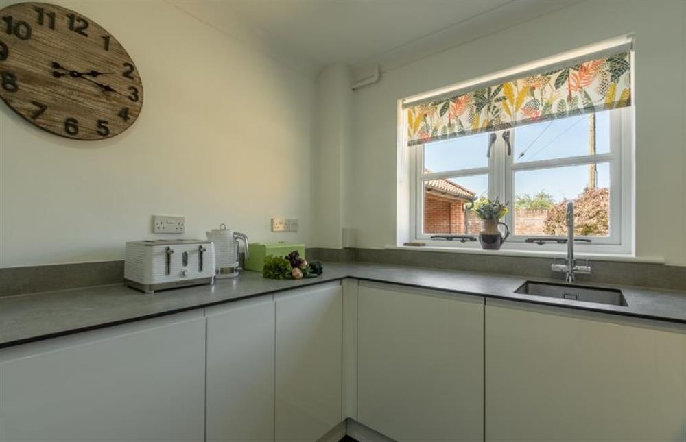 Ground floor:  Kitchen with plenty of cupboard space at The Old Joinery, Cley-next-the-Sea near Holt