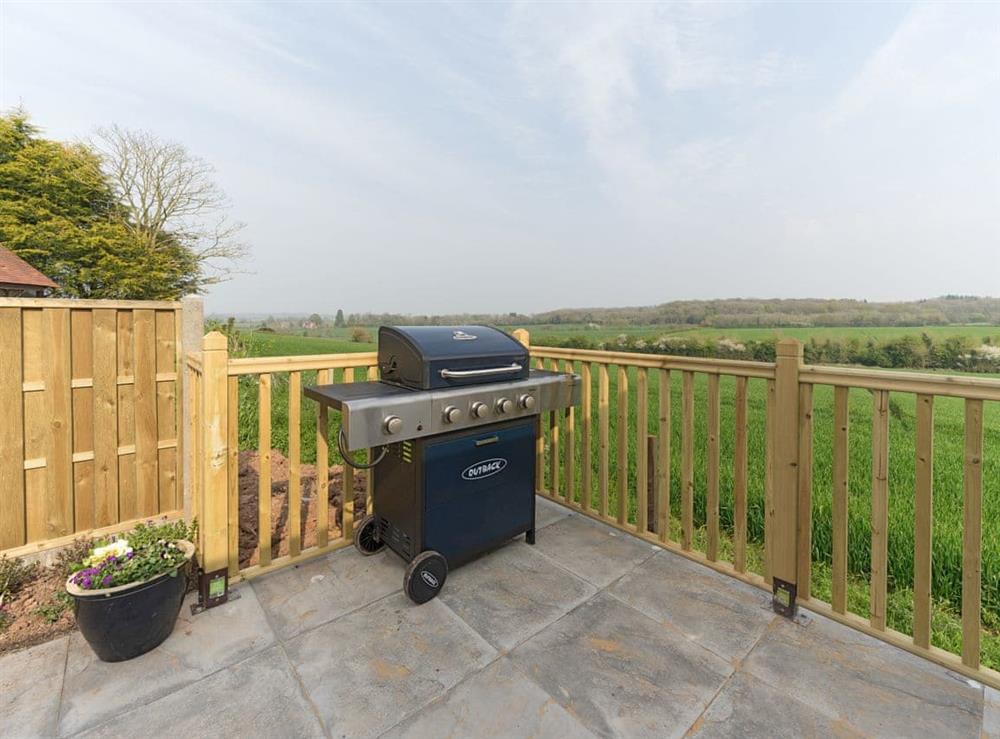 BBQ on the patio at The Old Kennels in Tibberton, near Gloucester, Gloucestershire
