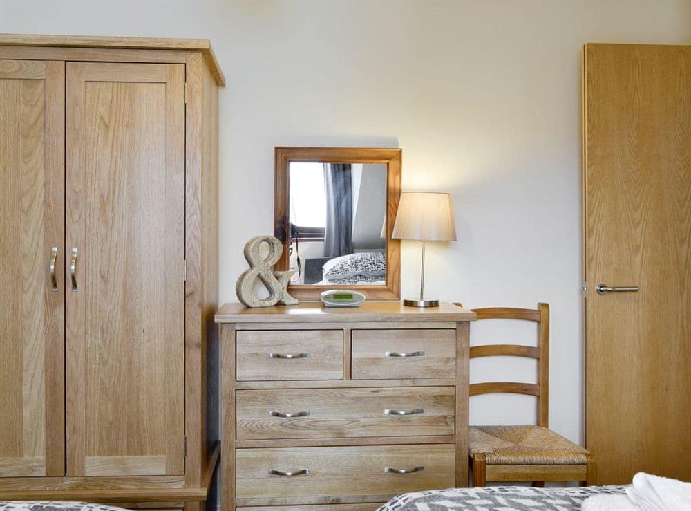 Ample storage within twin bedroom at The Old Laundry 4 in Keswick, Cumbria