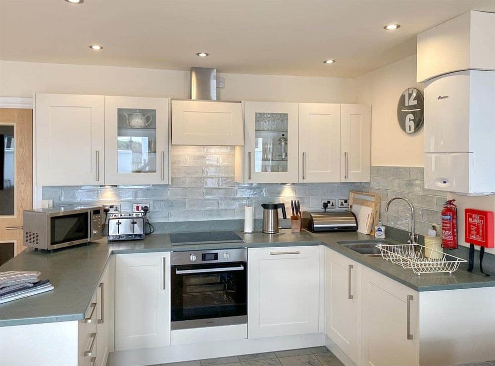 Well equipped kitchen area at The Old Laundry 4 in Keswick, Cumbria