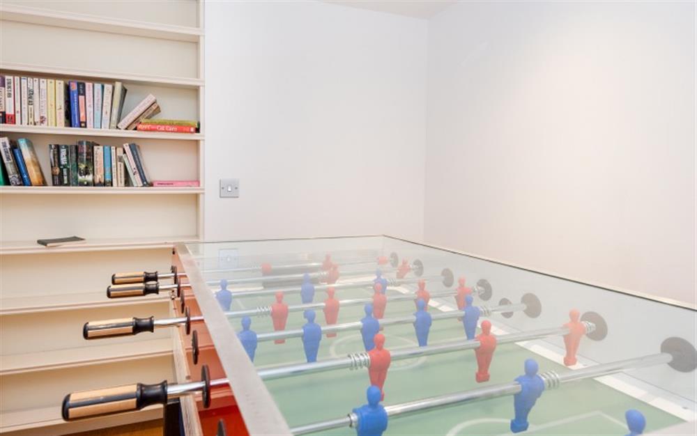 Bring out your competitive streak with a game of foosball.