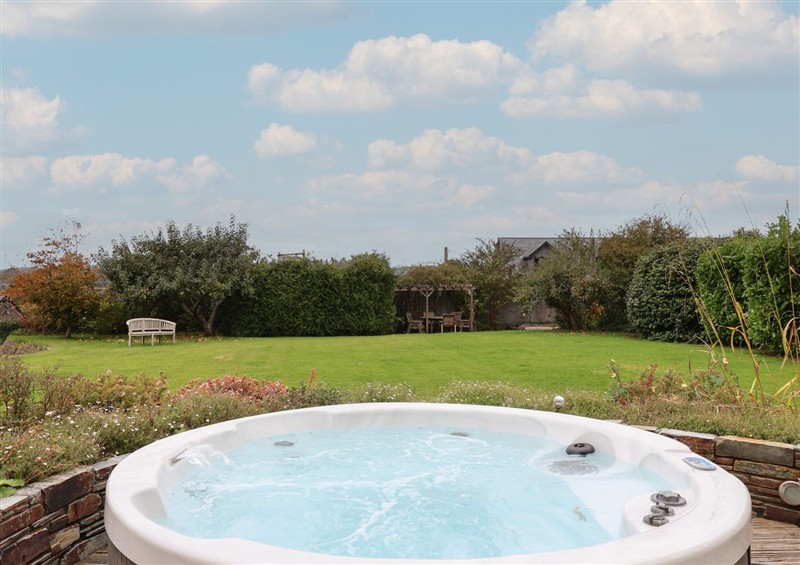 There is a hot tub at The Old Manor House, Lifton