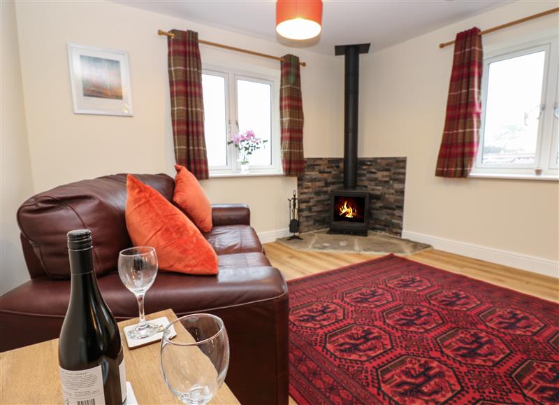 Relax in the living area at The Old Milk House, Eppleby