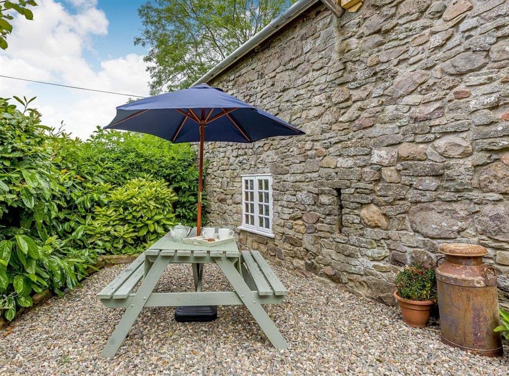 Outdoor eating area at The Old Milking Parlour in Lydbury North, Shropshire