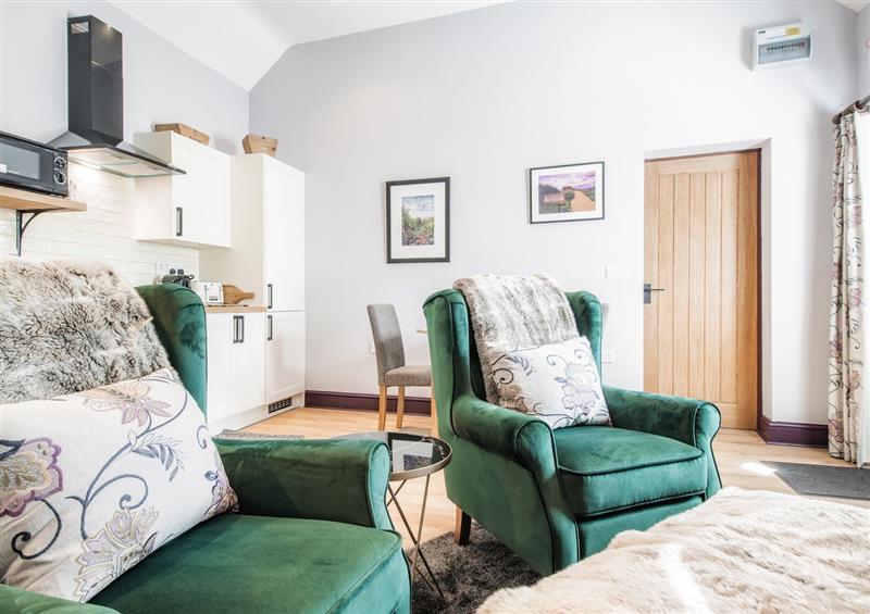 Enjoy the living room at The Old Milking Parlour, Skipsea
