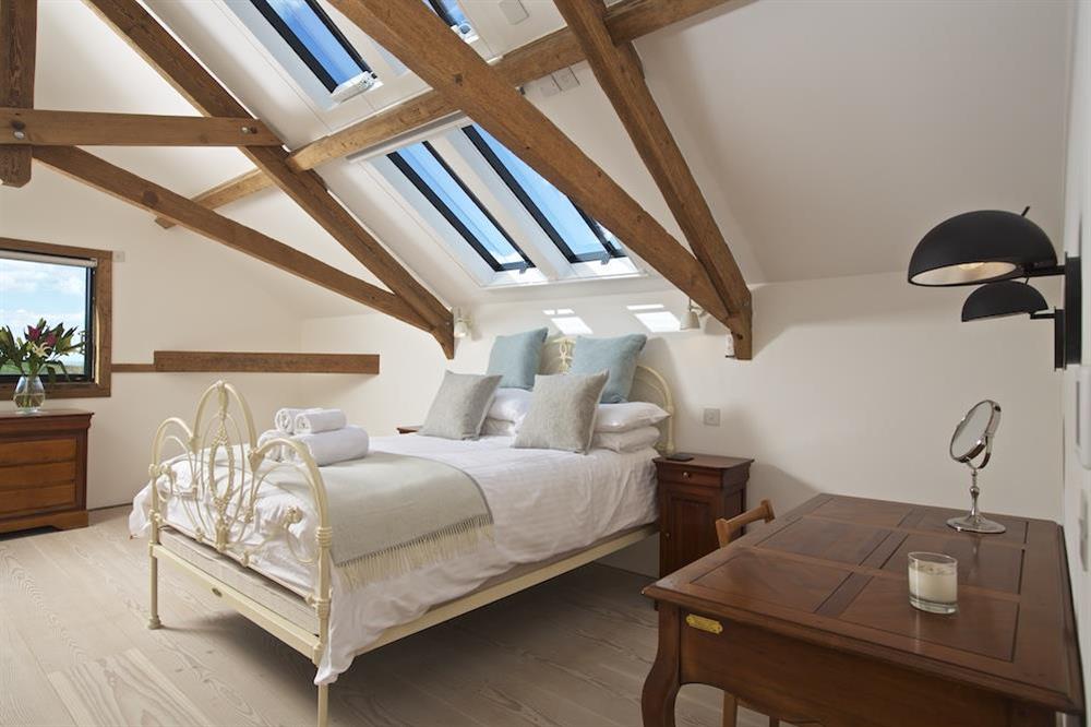 Bedroom with King-size bed at The Old Milking Shed in , Bantham
