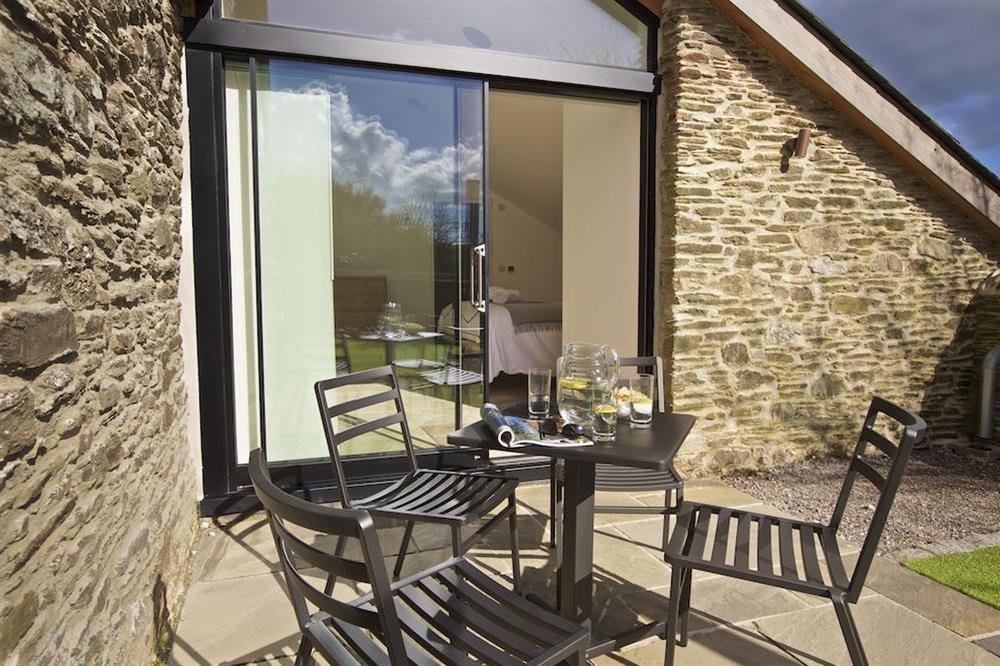 Outside seating provides the perfect spot for alfresco dining at The Old Milking Shed in , Bantham