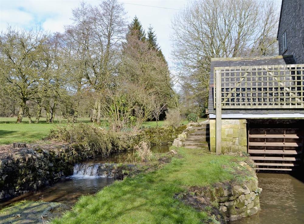 The restored mill wheel at The Old Mill Annexe in Buxton, Derbyshire