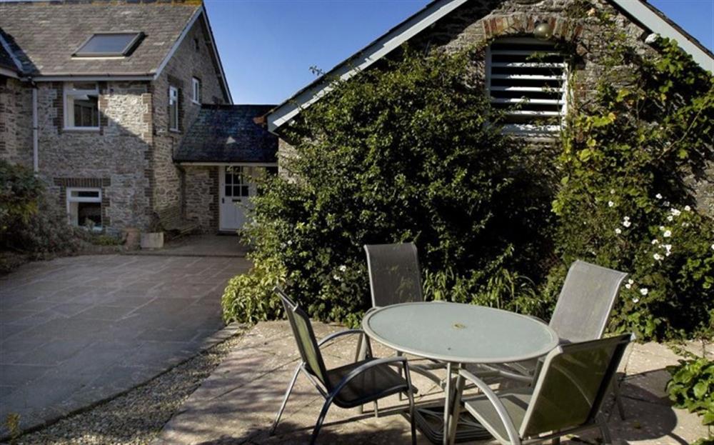 The patio area in the sheltered courtyard. at The Old Mill in East Portlemouth