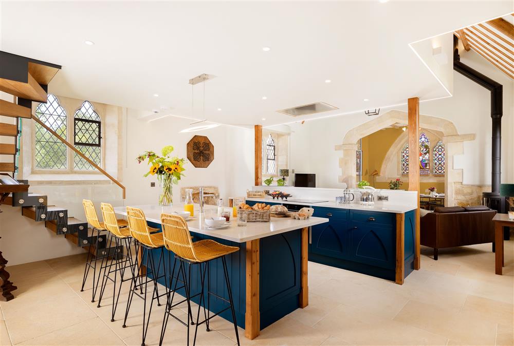 Ground floor: The Stunning designer kitchen with its sociable island at The Old Mission Church, Paxford, near Chipping Campden