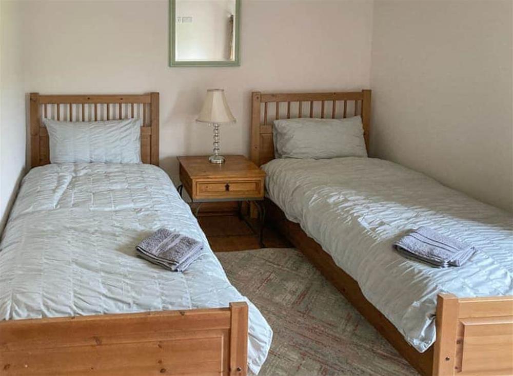 Twin bedroom at The Old Moat Lane Station in Newtown, Powys