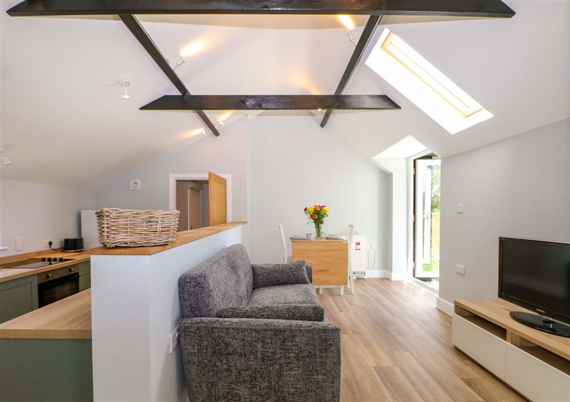 Relax in the living area at The Old Parlour, Durley