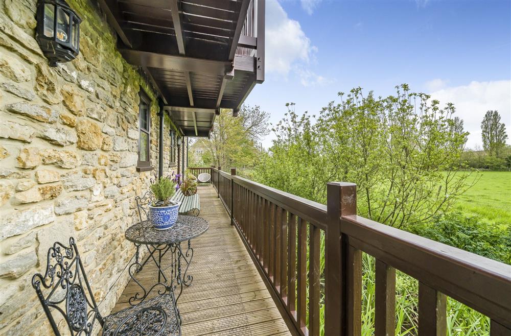 Enjoy the views of the extensive countryside at The Old Piggeries, Burton Bradstock, Bridport