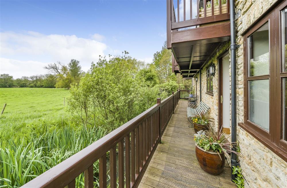 Ground floor balcony with beautiful views of the Dorset countryside at The Old Piggeries, Burton Bradstock, Bridport
