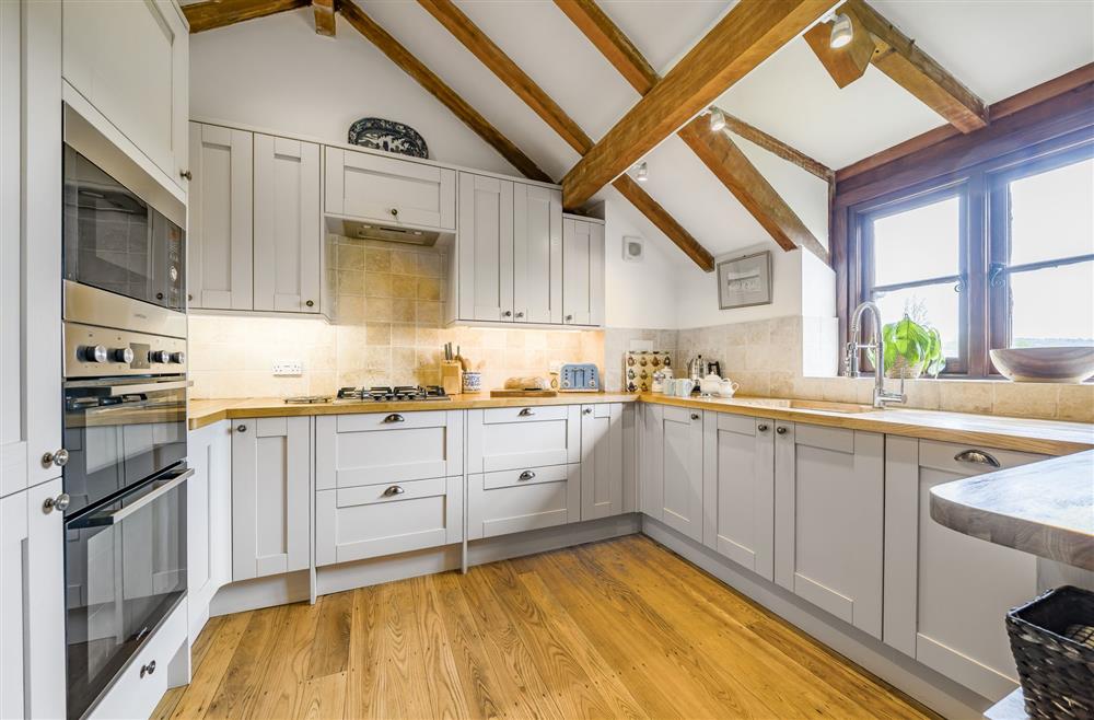 Well-equipped and bright kitchen at The Old Piggeries, Burton Bradstock, Bridport