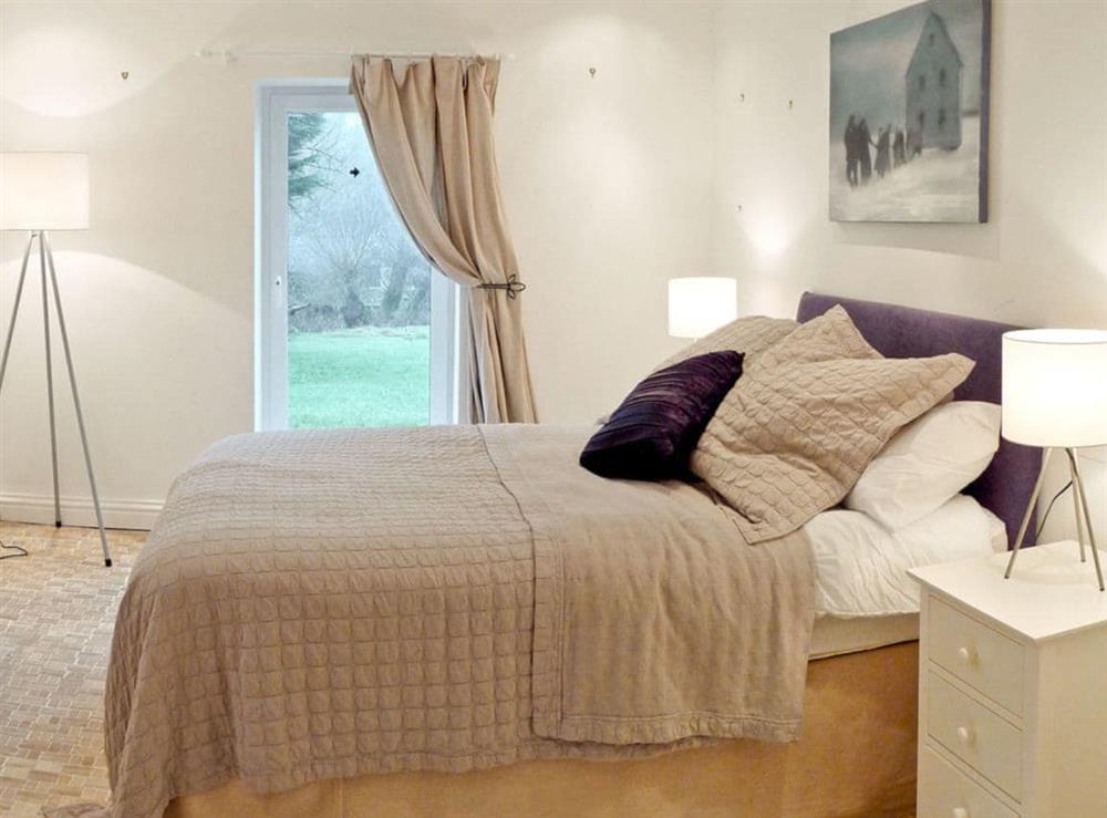 Double bedroom at The Old Pool House in Sevenhampton, near Cheltenham, Glos., Gloucestershire