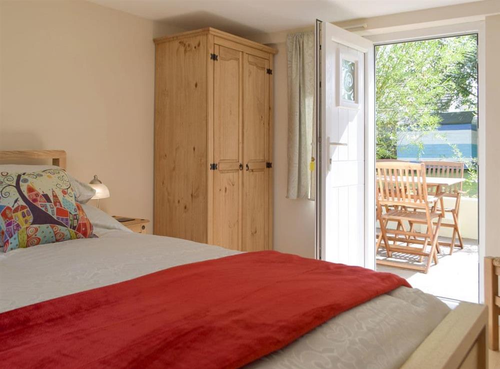 Relaxing double bedroom with access to garden at The Old Post House in Penffordd, near Narberth, Dyfed