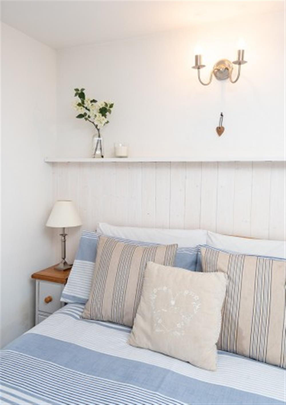 One of the  bedrooms at The Old Post Office in Beesands