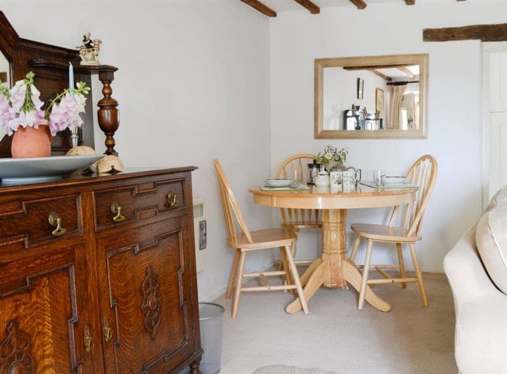 Charming dining area at The Old Post Office in Chedworth, near Cheltenham, Gloucestershire