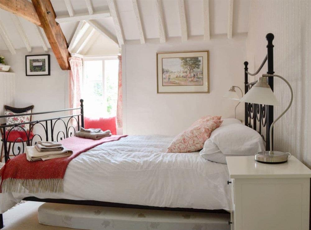Spacious double bedroom at The Old Post Office in Chedworth, near Cheltenham, Gloucestershire