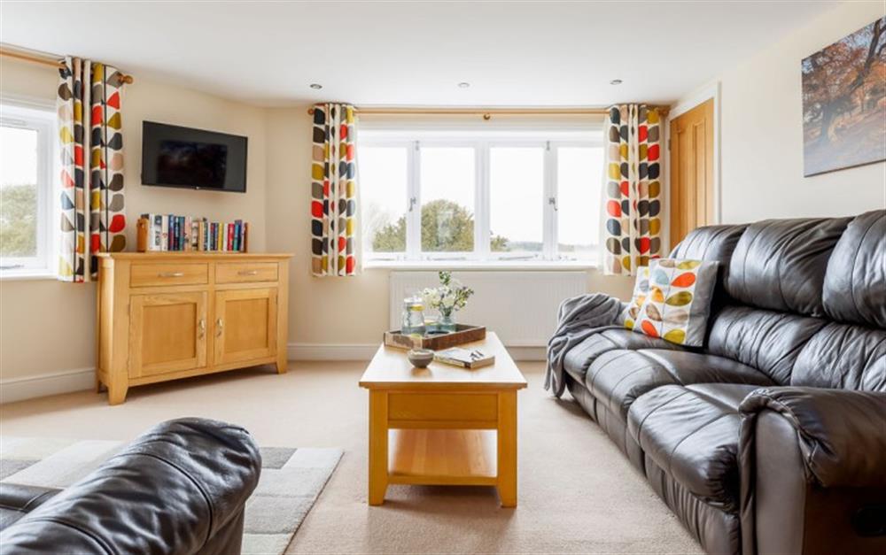 Enjoy the living room at The Old Post Office in Emery Down