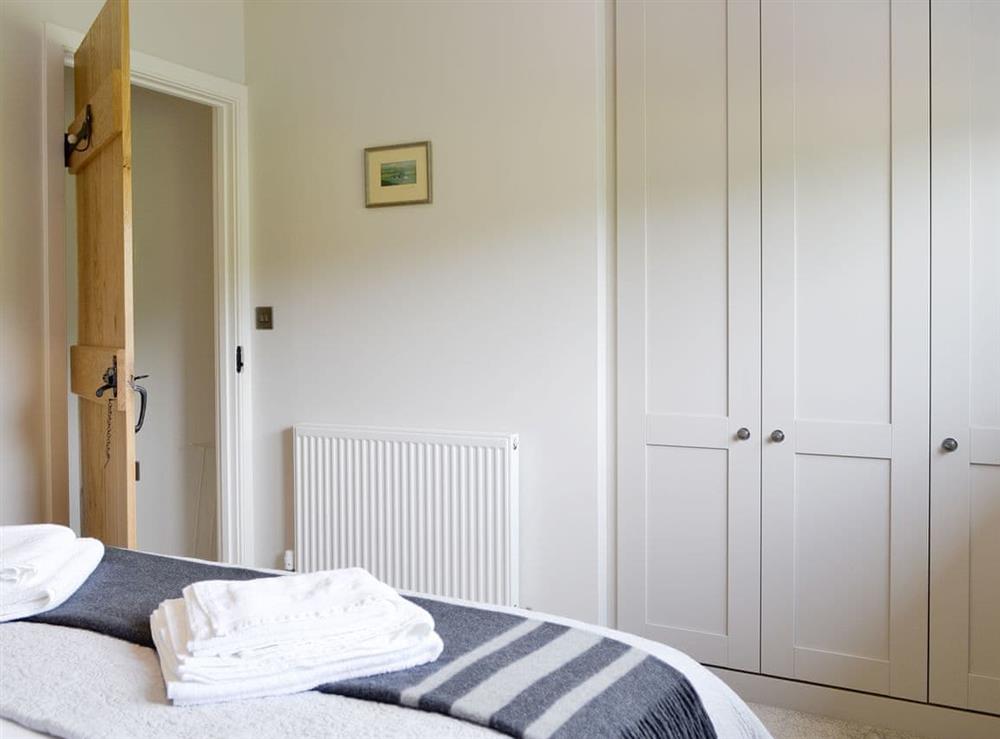 Ample built-in storage within the double bedroom at The Old Post Office Gillerthwaite in Loweswater, near Cockermouth, Cumbria