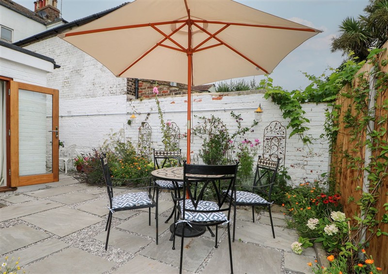 Enjoy a cup of tea on the patio at The Old Post Office, Littlehampton