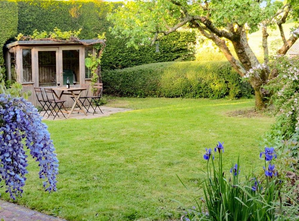 The peaceful garden at The Old Post Office in Lower Bockhampton, Dorset