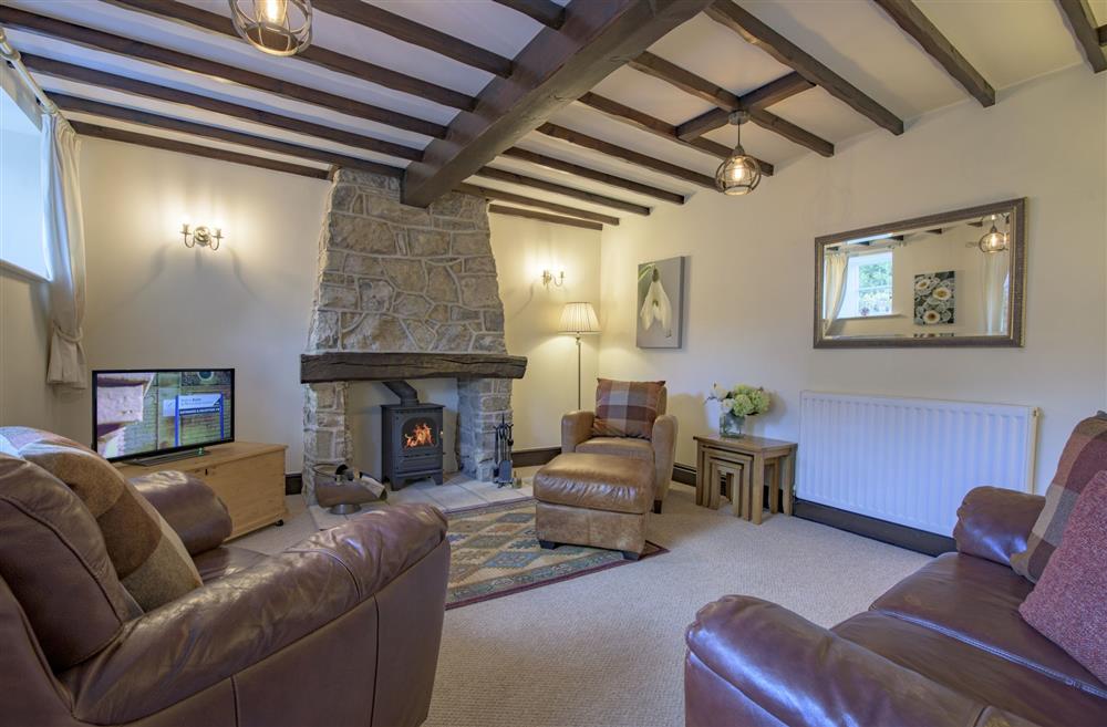 Cottage sitting room with comfortable seating at The Old Potting Shed, Kirkbymoorside, York, North Yorkshire